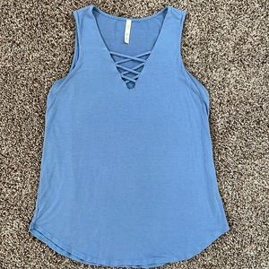 Light Blue Sleeveless Blouse with Criss-Cross Neckline